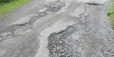 How can I claim for damage caused by potholes?